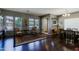 Spacious living room with elegant hardwood floors, high ceilings, and ample natural light at 4609 W Challenger Trl, New River, AZ 85087