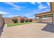 Backyard featuring manicured lawn and a pergola at 4866 N 185-Th Dr, Goodyear, AZ 85395
