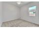 Bright bedroom with carpet flooring and a ceiling fan at 4866 N 185-Th Dr, Goodyear, AZ 85395