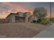 Exterior view of a home featuring a driveway and landscape at 4866 N 185-Th Dr, Goodyear, AZ 85395