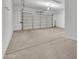 Spacious and clean garage with an automatic door and plenty of room for vehicles and storage at 4866 N 185-Th Dr, Goodyear, AZ 85395