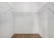 Walk-in closet with carpeting and shelving, offering ample storage space at 544 S Crismon Rd, Mesa, AZ 85208