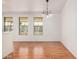 Well-lit dining room with laminate flooring and ample space for entertaining at 544 S Crismon Rd, Mesa, AZ 85208