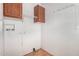Laundry room with open shelving, cabinets and washer and dryer hookups at 544 S Crismon Rd, Mesa, AZ 85208