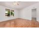 Bright and airy living room featuring laminate floors, natural light, and ample space at 544 S Crismon Rd, Mesa, AZ 85208