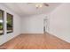 Spacious living room with laminate flooring, neutral walls, and abundant natural light at 544 S Crismon Rd, Mesa, AZ 85208