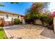 Private brick patio with mature trees offers shade and relaxation at 5744 E Oak St, Scottsdale, AZ 85257