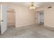 Cozy bedroom features a walk-in closet with an open doorway to another room at 5744 E Oak St, Scottsdale, AZ 85257