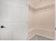 Bright, organized walk-in closet with rod and shelves for storage solutions at 5744 E Oak St, Scottsdale, AZ 85257