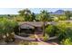 Charming home with mature landscaping, palm tree, and mountain views at 5744 E Oak St, Scottsdale, AZ 85257
