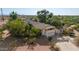 Aerial view of home showing the garage, landscaping, and driveway at 5744 E Oak St, Scottsdale, AZ 85257