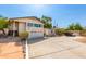Charming two-story home with a well-maintained yard, spacious driveway, and detached garage at 5744 E Oak St, Scottsdale, AZ 85257