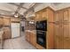 Well-equipped kitchen featuring sleek stainless steel appliances and plenty of storage space at 5744 E Oak St, Scottsdale, AZ 85257