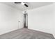 Bedroom featuring a ceiling fan, plush carpet, and bright light at 6140 W Berkeley Rd, Phoenix, AZ 85035