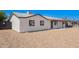 Another side view highlighting the low-maintenance landscaping and clean exterior of the home at 6140 W Berkeley Rd, Phoenix, AZ 85035
