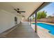 Wide covered patio perfect for outdoor gatherings near the in-ground pool at 6140 W Berkeley Rd, Phoenix, AZ 85035