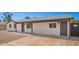 Extended covered side entry and rock yard landscaping for easy maintenance at 6140 W Berkeley Rd, Phoenix, AZ 85035