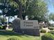 Community fitness center sign surrounded by lush green trees and landscaping at 6460 S Springs Pl, Chandler, AZ 85249