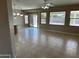 Expansive living area featuring tile flooring and ample natural light at 6460 S Springs Pl, Chandler, AZ 85249