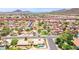 Beautiful birds-eye view of homes in the neighborhood and distant mountains on the horizon at 6645 E Preston St, Mesa, AZ 85215