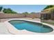 Sparkling private pool surrounded by low-maintenance desert landscaping at 6645 E Preston St, Mesa, AZ 85215