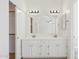 Bathroom with a double sink vanity and a large mirror at 6645 E Preston St, Mesa, AZ 85215