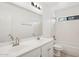 Bathroom featuring double sinks, neutral paint and a large mirror over the vanity at 6645 E Preston St, Mesa, AZ 85215