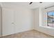 Neutral bedroom with window, closet and tile floors at 6645 E Preston St, Mesa, AZ 85215