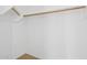 Empty walk-in closet features tile floors, overhead lighting and metal shelving at 6645 E Preston St, Mesa, AZ 85215
