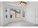 Bright living room with large windows provides natural light at 6645 E Preston St, Mesa, AZ 85215