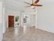 Open living area featuring tile floors, neutral paint, and a view to the front door at 6645 E Preston St, Mesa, AZ 85215