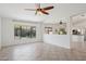 Inviting living room featuring tile floors, neutral walls, and large windows for natural light at 6645 E Preston St, Mesa, AZ 85215