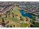 Wonderful aerial view of golf course community showcasing beautiful green spaces, ponds, and residential properties at 7531 W Kimberly Way, Glendale, AZ 85308
