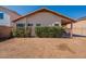 Great sized backyard with privacy hedge and covered patio, offering a perfect blend of privacy and open space at 7531 W Kimberly Way, Glendale, AZ 85308