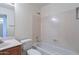 This bathroom includes a shower and bath combination, as well as a sink at 7531 W Kimberly Way, Glendale, AZ 85308