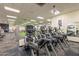 Modern fitness center with updated Cybex equipment and televisions for residents at 7531 W Kimberly Way, Glendale, AZ 85308