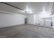 This garage provides space for a washer, dryer, and hot water tank at 7531 W Kimberly Way, Glendale, AZ 85308