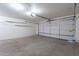 This garage features ample space for parking and storage at 7531 W Kimberly Way, Glendale, AZ 85308
