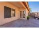 This patio features access to the home and a view of the backyard at 7531 W Kimberly Way, Glendale, AZ 85308
