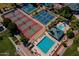 Overhead shot of multiple tennis courts and a large community pool, providing a variety of recreational options at 7531 W Kimberly Way, Glendale, AZ 85308