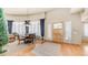 Bright dining room featuring hardwood floors, ample natural light, and stylish window shutters at 8540 E Mcdowell Rd # 116, Mesa, AZ 85207