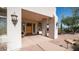 Inviting front entrance with desert landscaping, decorative lighting, and a stained glass door at 8540 E Mcdowell Rd # 116, Mesa, AZ 85207