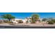 Attractive desert landscaping surrounds the front yard and entrance to this well appointed home at 8540 E Mcdowell Rd # 116, Mesa, AZ 85207