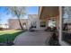 Relaxing covered patio with desert landscaping and a comfortable seating area at 8540 E Mcdowell Rd # 116, Mesa, AZ 85207