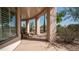 Relaxing covered patio overlooking the desert landscape with shade providing pillars at 8540 E Mcdowell Rd # 116, Mesa, AZ 85207