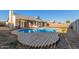 Backyard view featuring a private pool, patio area, and views of the home's exterior at 9009 W Butler Dr, Peoria, AZ 85345