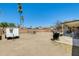 Expansive backyard featuring a grill, covered patio, and plenty of open space at 9214 N 54Th Ave, Glendale, AZ 85302