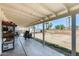 Covered patio area overlooking the spacious backyard at 9214 N 54Th Ave, Glendale, AZ 85302