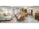 An open dining area connects to the kitchen and has a table for six and an adjoined seating area at 9214 N 54Th Ave, Glendale, AZ 85302