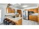 A light-filled kitchen offers stainless steel appliances, modern countertops, and ample cabinet space at 9214 N 54Th Ave, Glendale, AZ 85302